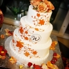 Orange Flower and Monogram Wedding Cake