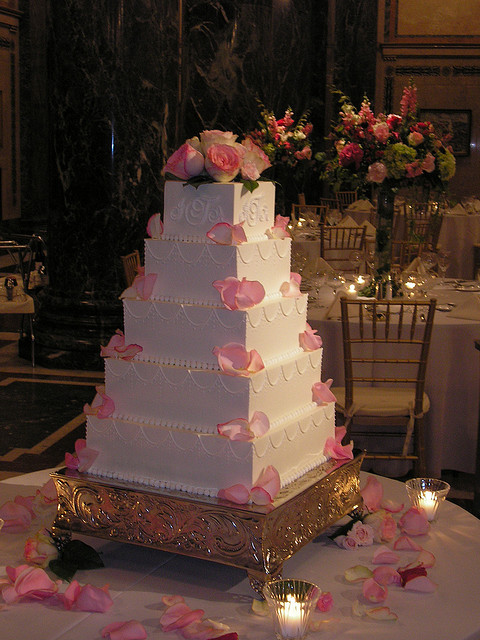 Square wedding cakes with pink roses
