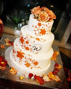 orange monogram wedding cake