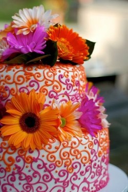 orange and magenta wedding cake