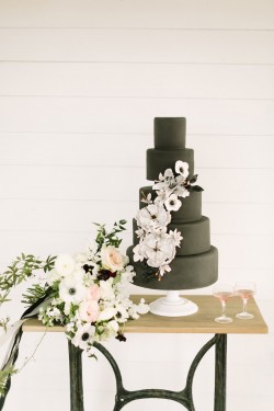 black cake with white flowers