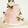 Pink Wedding Cake with White Trim