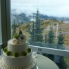White Wedding Cake with Green Mums