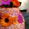 Orange and Magenta Scroll Wedding Cake