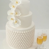 White Wedding Cake with Orchids