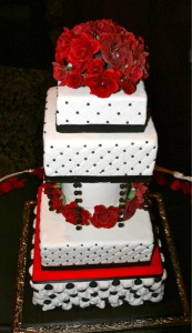 Black, red and white wedding cake