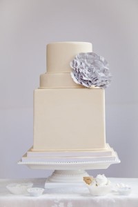 Square and round white wedding cake