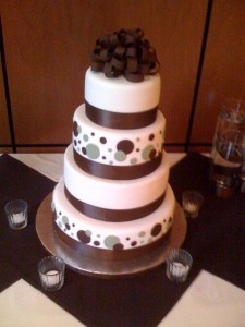 Brown polka dot and bow cake